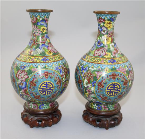 A pair of Chinese cloisonne enamel millefleur baluster vases, early 20th century, total height 22cm
